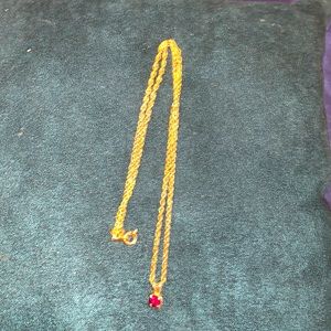 Gold chain with Ruby pendant